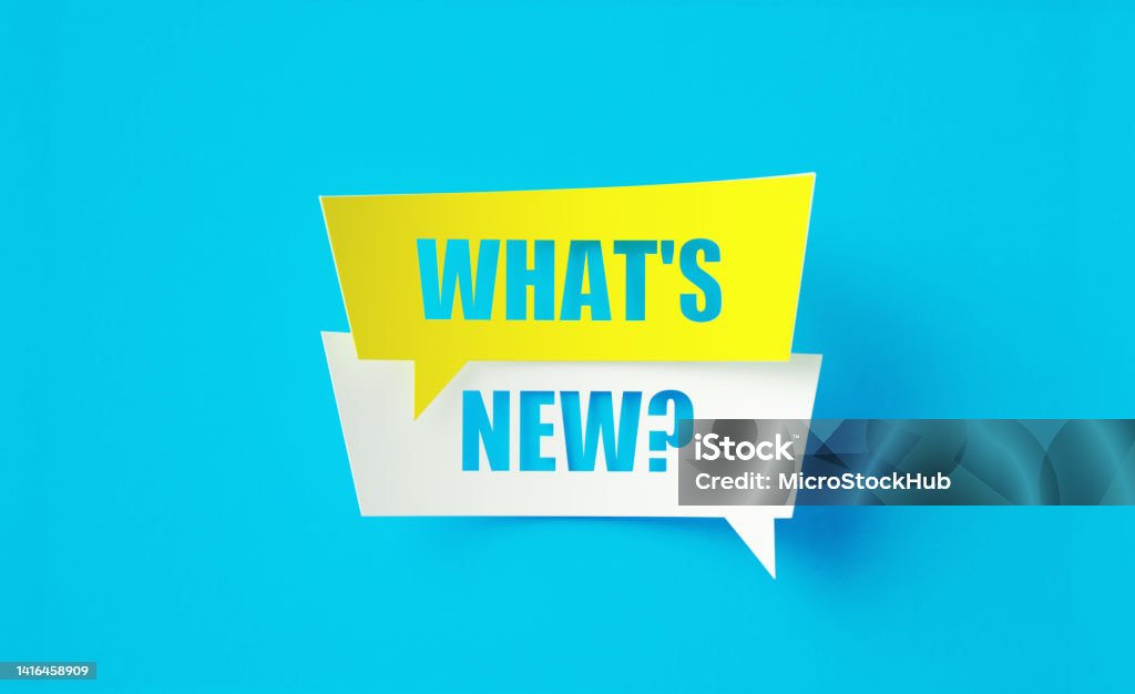 What's New Written Cut Out Yellow And White Speech Bubbles Sitting Over Blue Background What's New written cut out yellow and white speech bubbles sitting on blue background. Horizontal composition with copy space. New Stock Photo