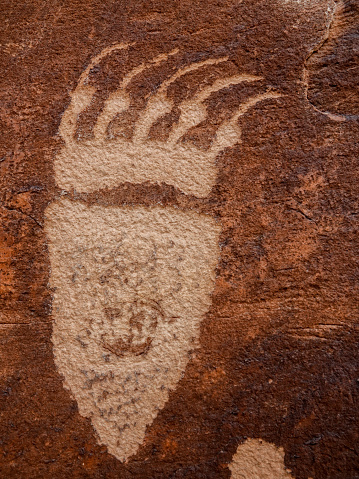 Ancient bear claw petroglyph. Fremont Culture, Utah.