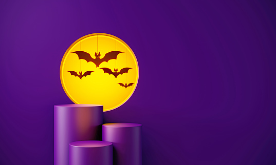 Purple podiums sitting before yellow circle on purple background, Horizontal composition with copy space. Halloween concept.