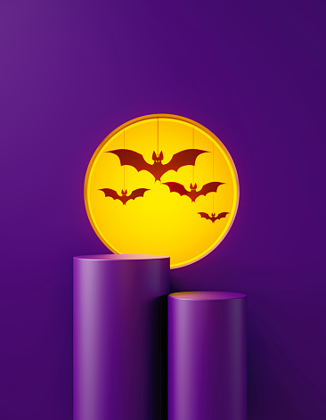 Purple podiums sitting before yellow circle on purple background, Horizontal composition with copy space. Halloween concept.