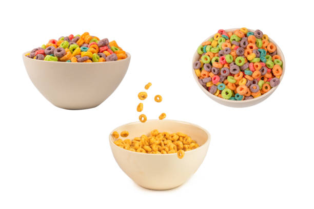 istock Colorful rings cereal spill out into a bowl. Breakfast. Isolated. 1416468069
