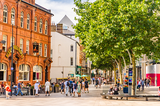 Cardiff, United Kingdom Pedestrianised street in the historic center of the city with many people on the streets