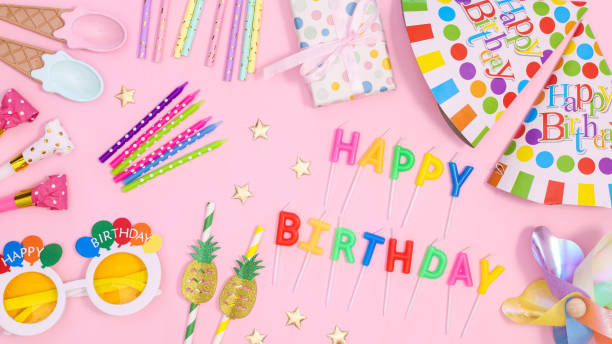 istock Birthday party background with party accessories on pastel pink theme. Flat lay 1416471908