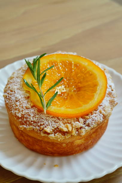 istock Sweet and simply cake with orange on top 1416472135