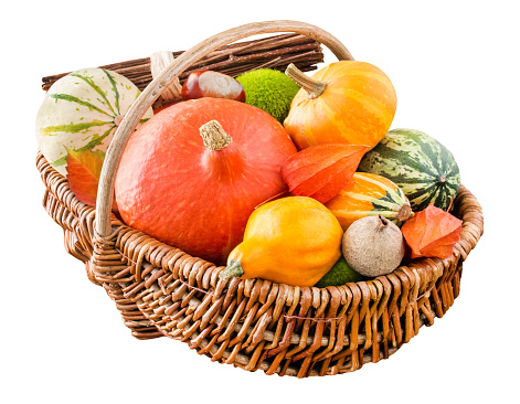 Colorful natural Autumn decoration in a basket isolated on white background