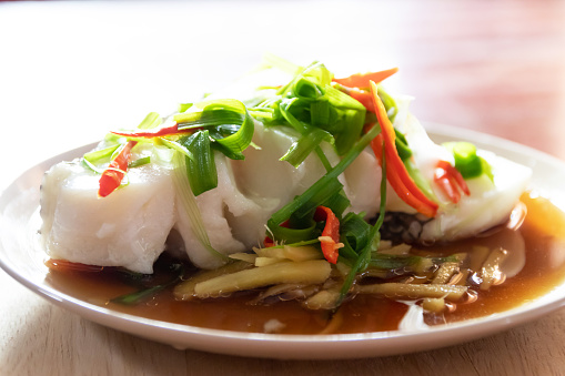 Steamed snow fish with soy sauce. Snow fish, soy sauce, ginger, scallion and chili.
