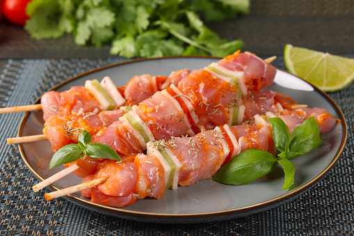 Chicken and Turkey Kebabs on Skewers before cooking. High resolution image 45Mp taken with Canon EOS R5 mirrorless with associate macro lens