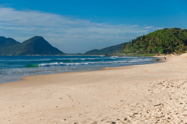 istock Morro das Pedras beach and blue ocean with waves. Brazil beach 1416478656