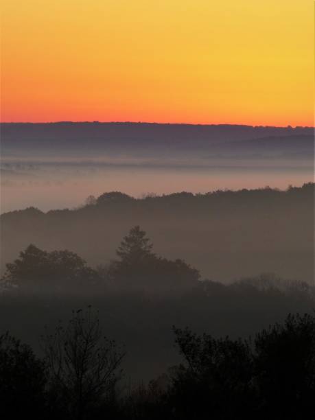 istock Colorful Dawn Over Misty Hills 1416478741
