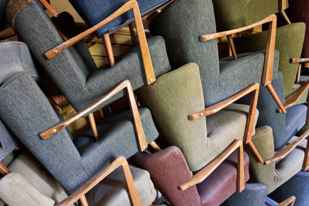 istock Pile of stacked vintage armchairs 1416484362