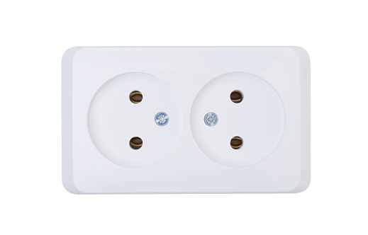 Modern white plastic electrical socket isolated on white.