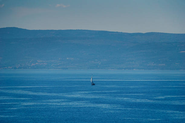 single boat all alone at sea