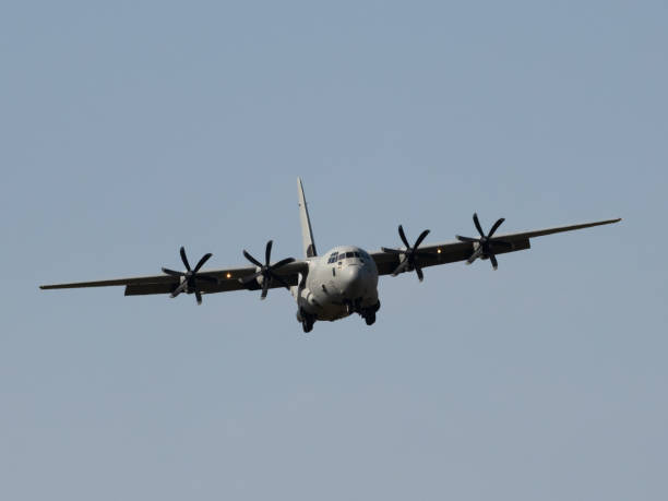 istock Military airplane flying in the sky 1416502600