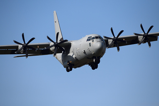 Wales, United Kingdom - 25th May 2022 - RAF (Royal Air Force) Lockheed C-130 Hercules transport plane carrying out low level flying in the Mach Loop.