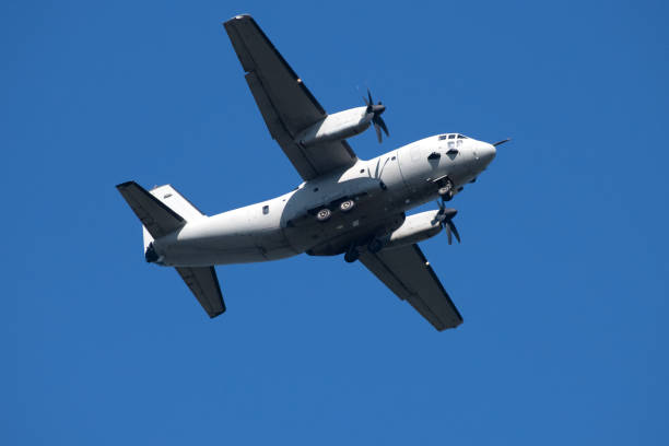 istock Military airplane flying in the sky 1416502628