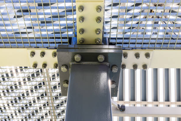 istock Part of a massive metal structure with bolts and rivets at the steel framework 1416518746