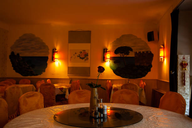 Seat and table in traditional Japanese restaurant are available to service for customer. Selective focus at the front chair.