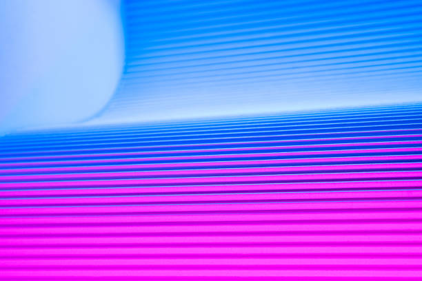 istock Neon hues over corrugated magenta and blue background. 1416522377