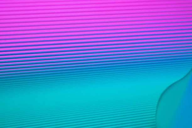 istock Neon hues over corrugated magenta and teal background. 1416524204