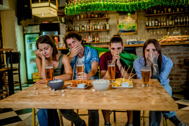 istock Disappointed fans watching a sports game 1416551503