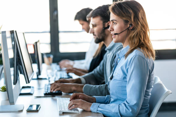 istock Successful concentrated business team working together with computers on coworking place. 1416554003
