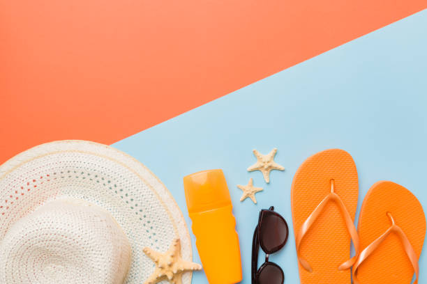 istock Summer vacation concept flat lay. straw hat beach accessories and flip flop top view. Space for text. travel concept 1416576441
