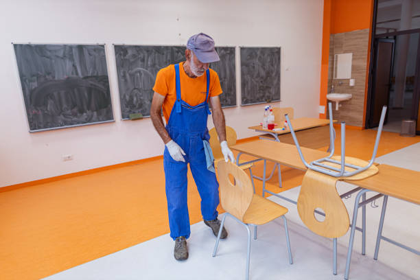 istock Janitor disinfects the high school classroom 1416578681