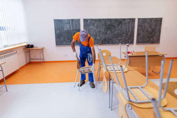 istock Janitor disinfects the high school classroom 1416578682