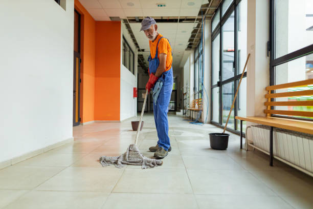 istock Janitor cleaning floor at school 1416581402