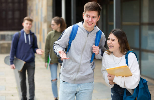 istock Cheerful teenagers talking outside after lessons 1416597060