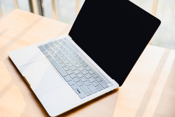 istock Office stationery such as computers at dusk 1416619430