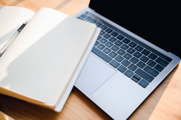 istock Office stationery such as computers at dusk 1416620244