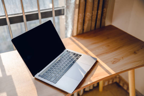 istock Office stationery such as computers at dusk 1416621765