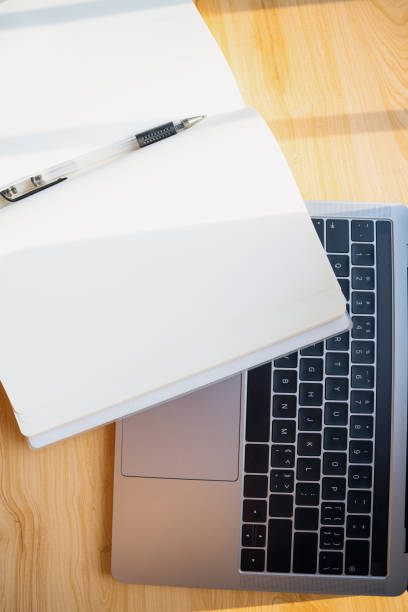 istock Office stationery such as computers at dusk 1416621868