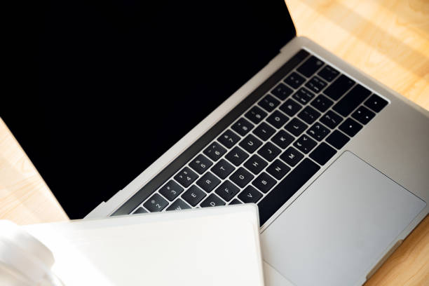 istock Office stationery such as computers at dusk 1416621893
