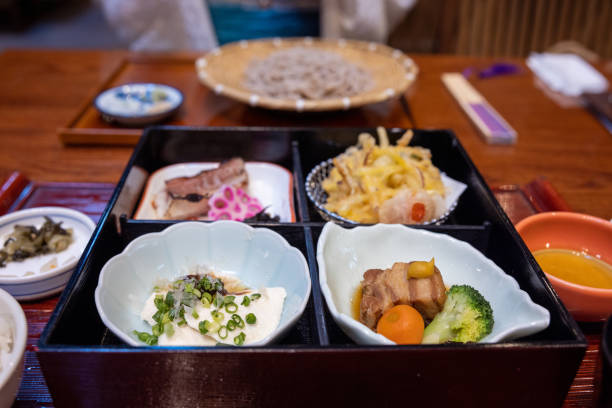 Japanese woman visiting traditional Japanese town. Renting a white lace kimono, eating Japanese food and shopping in retro style Japanese stores, etc.