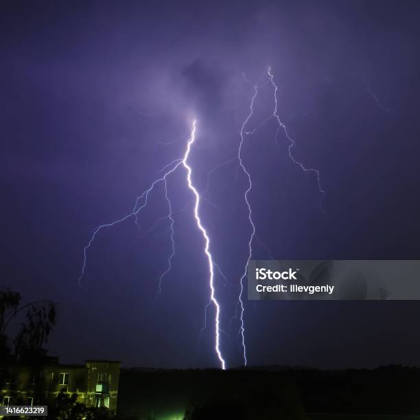 Lightning On Background Of Night Sky Weather And Climate Flash Of Lightning Natural Disaster Dark Dramatic Sky Storm Stock Photo - Download Image Now