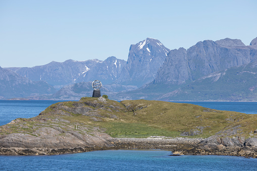 The tiny island of Vikingen sits astride the Arctic Circle and has a monument of a globe to mark this fact.