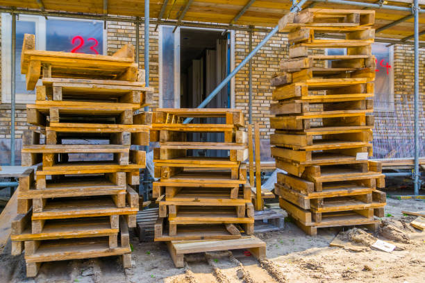 pallet stacks at construction site of Rucphen, The Netherlands, 6 may, 2022 pallet stacks at construction site of Rucphen, The Netherlands, 6 may, 2022 jetting stock pictures, royalty-free photos & images