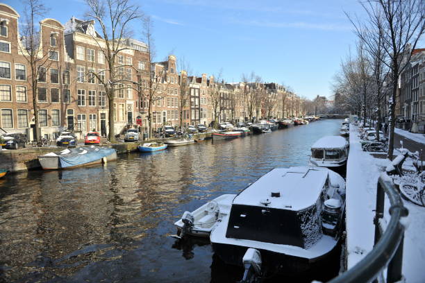 istock Holland winter snow in Amsterdam city view 1416643103