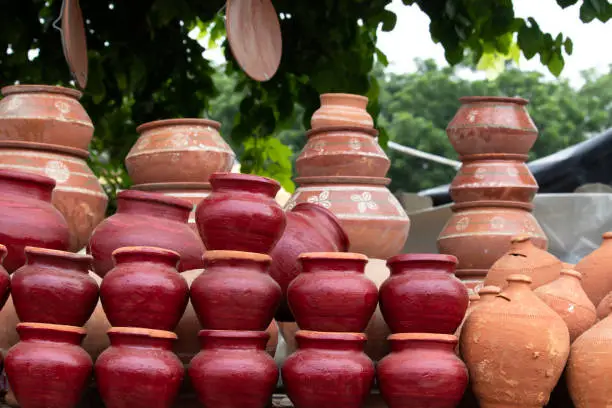 Handmade Terracotta Ceramic Clay-Based Earthenware Used For Cooking Or Storing Food And During Traditional Festival Celebration In India. Piled Up Variety Of Unglazed Or Glazed Hard, Fired Clay Ceramic