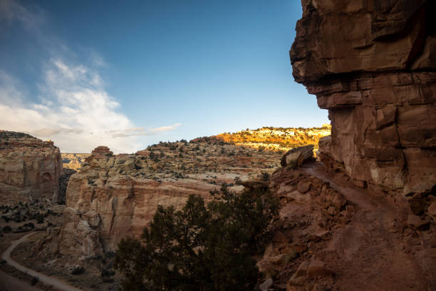 istock Trail Winds Around Red Rock Cliff in Capitol Reef 1416693479