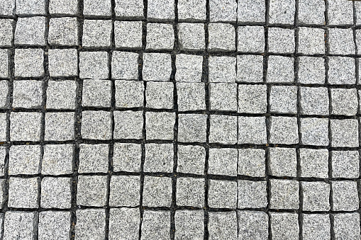 Outdoor stone tiles. Garden pavement