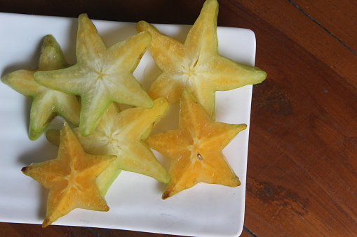 star fruit slices on a plate