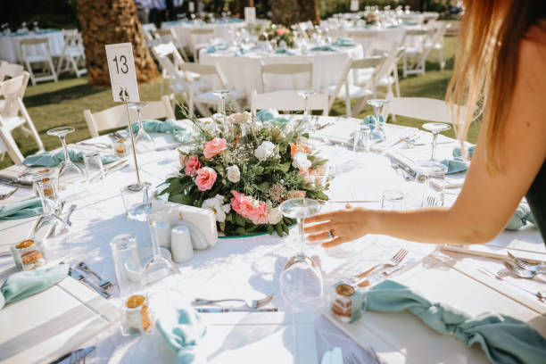 istock Young woman making fresh flowers wedding decoration 1416702787