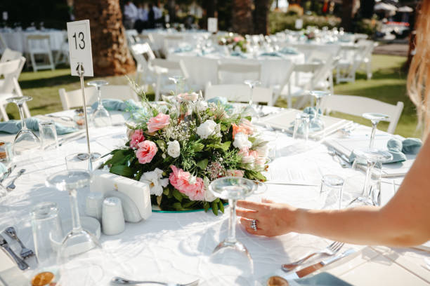 istock Young woman making fresh flowers wedding decoration 1416703237