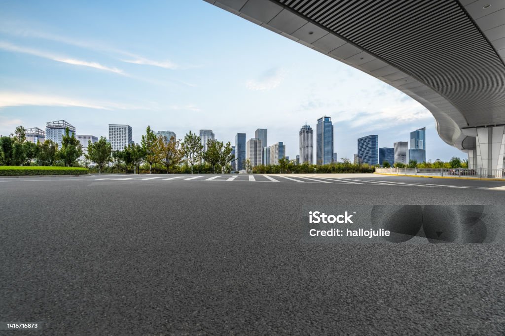 empty asphalt road with city skyline background in china Asia, China - East Asia, Street, Urban Road, Architecture Street Stock Photo