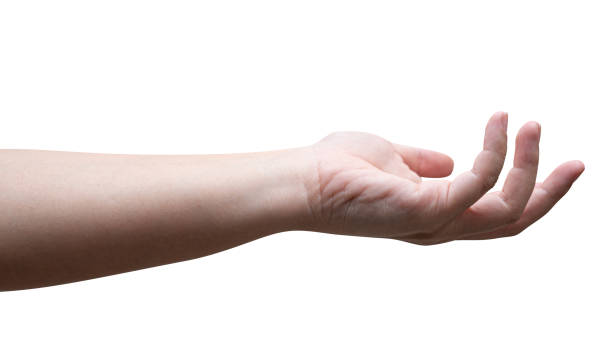 istock isolated of a woman's hand holding something. 1416723326