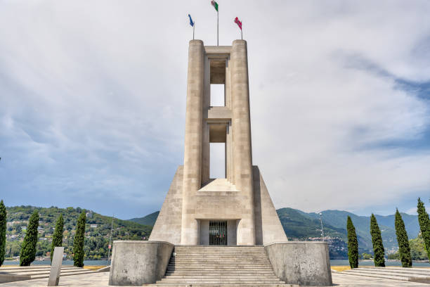 Lake Como, Italy - July 4, 2022: Lake Como World  War 1 Memorial It was planned by Giuseppe Terragni with the collaboration of his brother Attilio in the 1930s, inspiring to a design of futurist Antonio Sant' Elia, from Como
