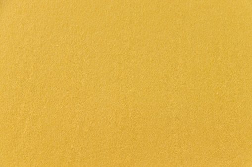 Texture of light ocher wallpaper